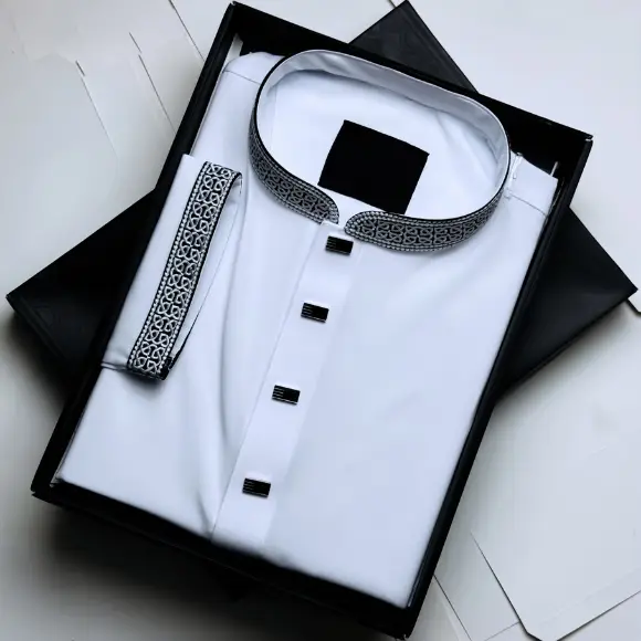 White men's panjabi with black and white geometric embroidered collar and cuffs, black rectangular buttons, displayed in a black gift box
